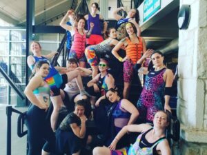 Victorian Roller Derby League Thunder (Bees) team dressed in bright coloured lycra for warm up!