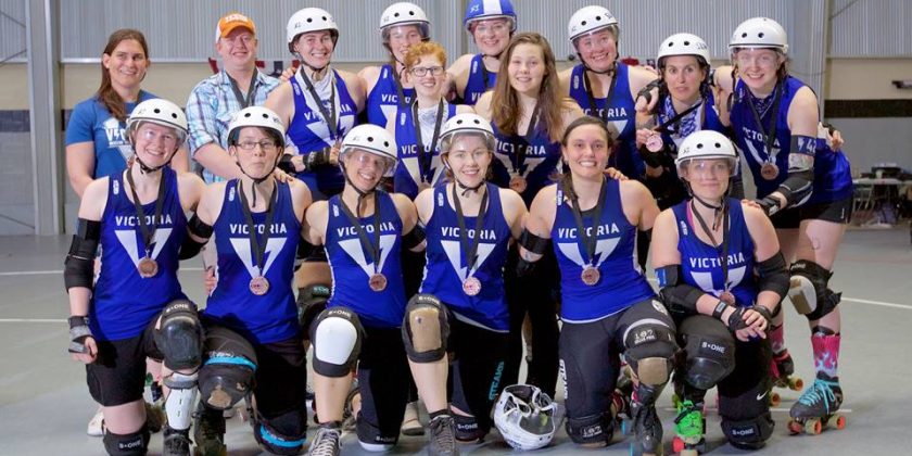 A photo of the VRDL Thunder (Bees) team after coming 2nd in the WFTDA B Team Championships in 2019.